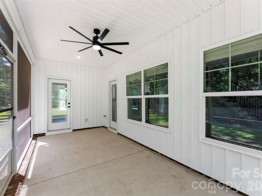 5005 Oconee Drive, Stanley, NC 28164.  MLS# CAR4402337, YatesRealty ID 40096. Screened in back porch