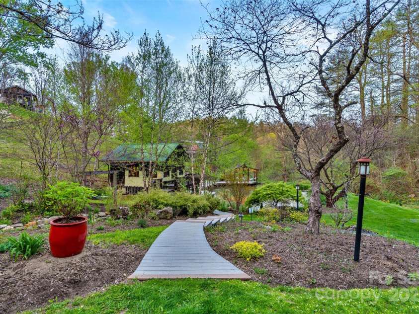 3717 Bend Of Ivy Road, Marshall, NC 28753.  MLS# CAR4209288, YatesRealty ID 401. Beautiful walkways and landscaping throughout this property!