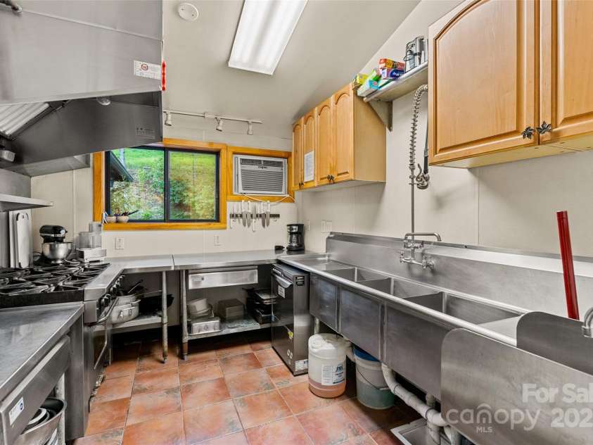 3717 Bend Of Ivy Road, Marshall, NC 28753.  MLS# CAR4209288, YatesRealty ID 401. Commercial Kitchen in the main lodge