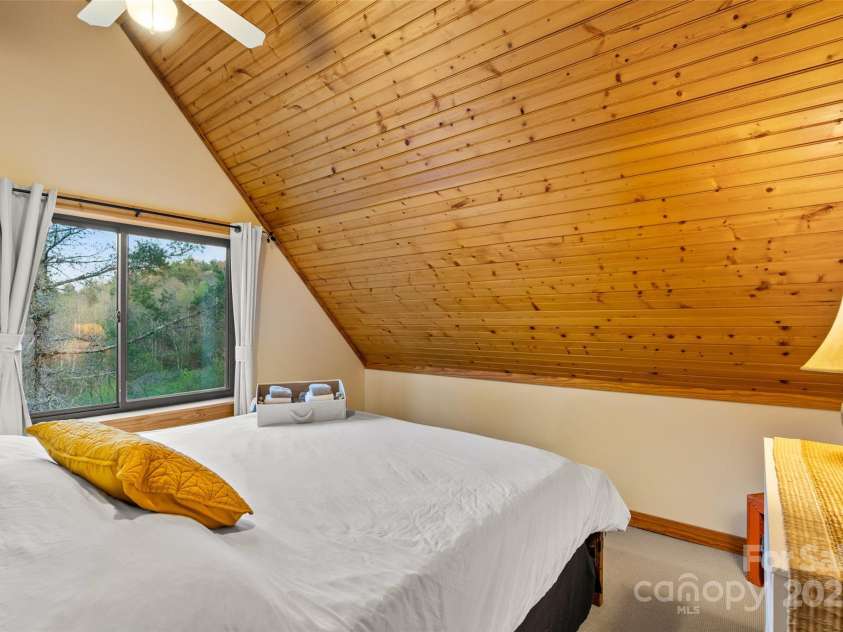 3717 Bend Of Ivy Road, Marshall, NC 28753.  MLS# CAR4209288, YatesRealty ID 401. One of several bedrooms in the main lodge