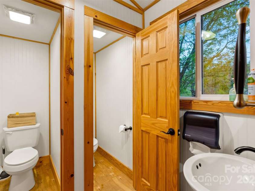 3717 Bend Of Ivy Road, Marshall, NC 28753.  MLS# CAR4209288, YatesRealty ID 401. Two half baths in the pavilion