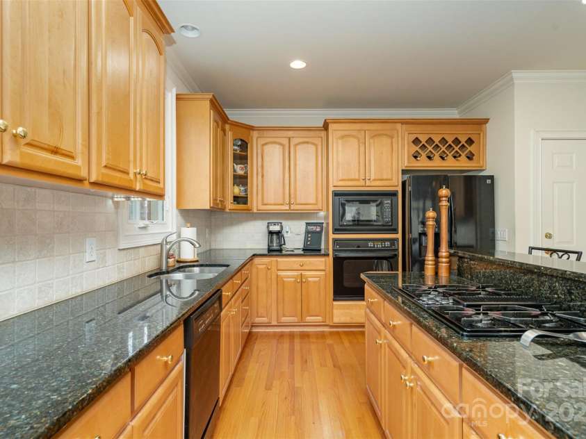 4828 Beth Lane, Harrisburg, NC 28075.  MLS# CAR4231144, YatesRealty ID 4010. Abundant Granite Counter Space & Cabinets