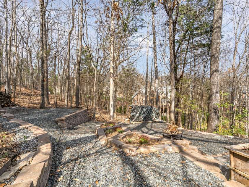 4828 Beth Lane, Harrisburg, NC 28075.  MLS# CAR4231144, YatesRealty ID 4010. Hard Scape Landscape creates an Outdoor Living Area