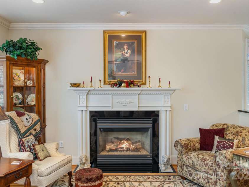 4828 Beth Lane, Harrisburg, NC 28075.  MLS# CAR4231144, YatesRealty ID 4010. Warm up to the Gas Log Fireplace