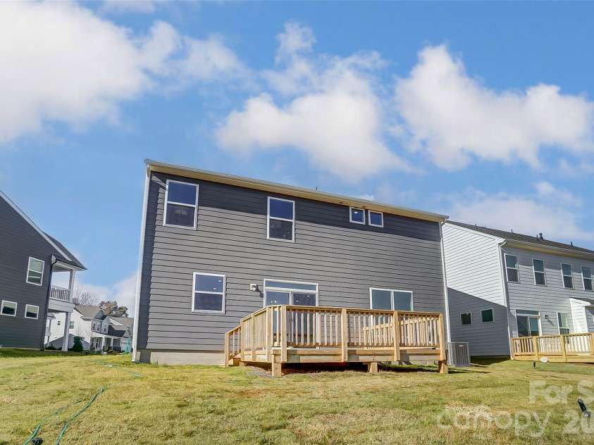 2223 Caravan Lane, Stanley, NC 28164.  MLS# CAR4398021, YatesRealty ID 40101. Rear of home