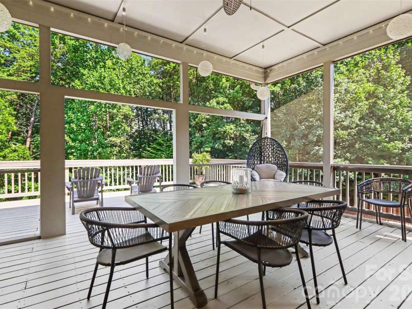 122 Campanile Drive, Mooresville, NC 28117.  MLS# CAR4405204, YatesRealty ID 40104. Covered screened deck