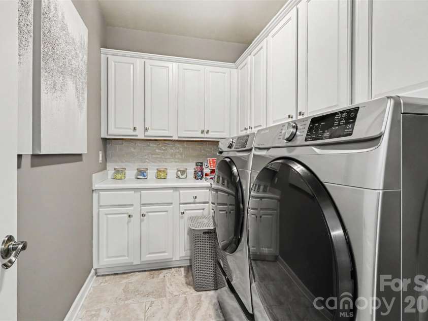 122 Campanile Drive, Mooresville, NC 28117.  MLS# CAR4405204, YatesRealty ID 40104. Main level laundry