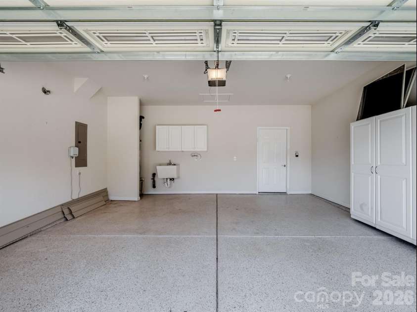 2035 Kennedy Drive, Indian Land, SC 29707.  MLS# CAR4278043, YatesRealty ID 4011. Garage with Sink & Built-In Storage