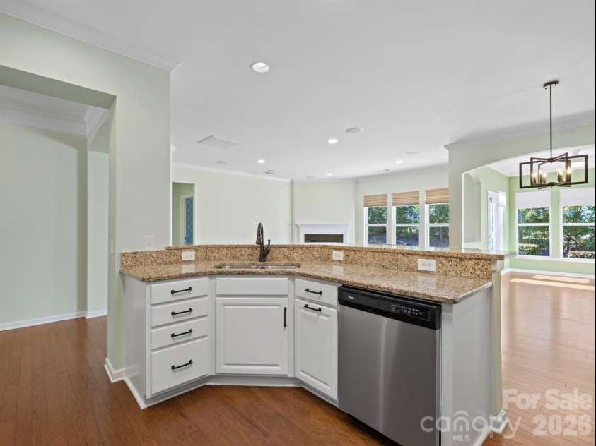2035 Kennedy Drive, Indian Land, SC 29707.  MLS# CAR4278043, YatesRealty ID 4011. Kitchen with white cabinets and updated backsplash