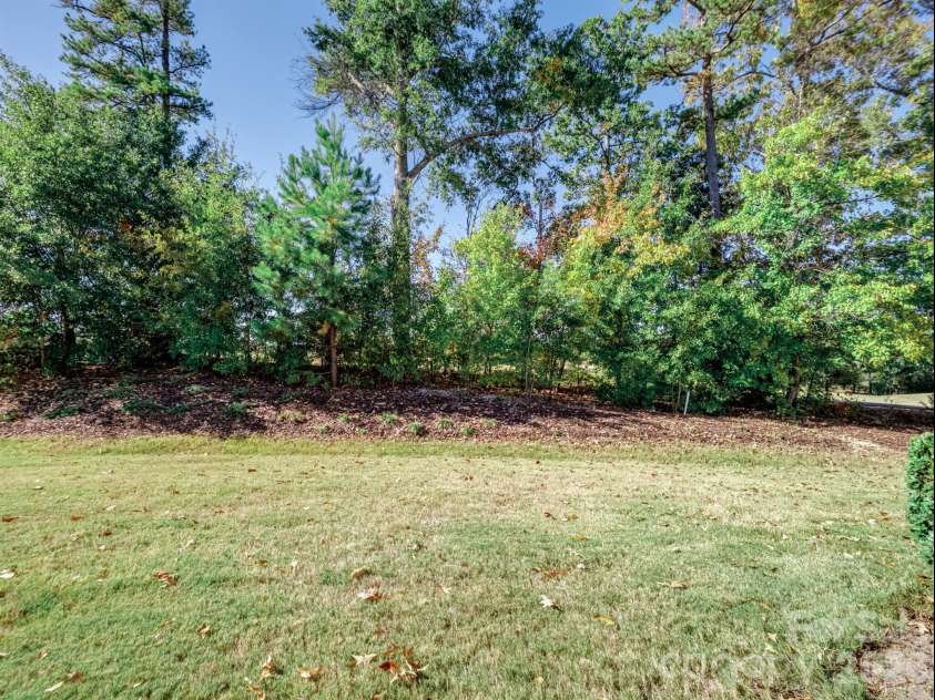 2035 Kennedy Drive, Indian Land, SC 29707.  MLS# CAR4278043, YatesRealty ID 4011. Private Backyard that backs up to golf course