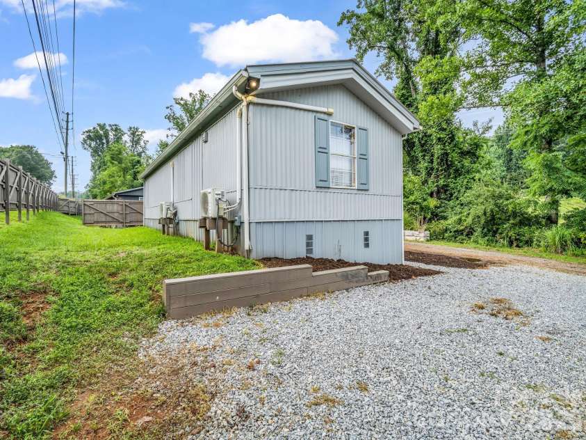 144 Clayton Road, Arden, NC 28704.  MLS# CAR4408237, YatesRealty ID 40113. 