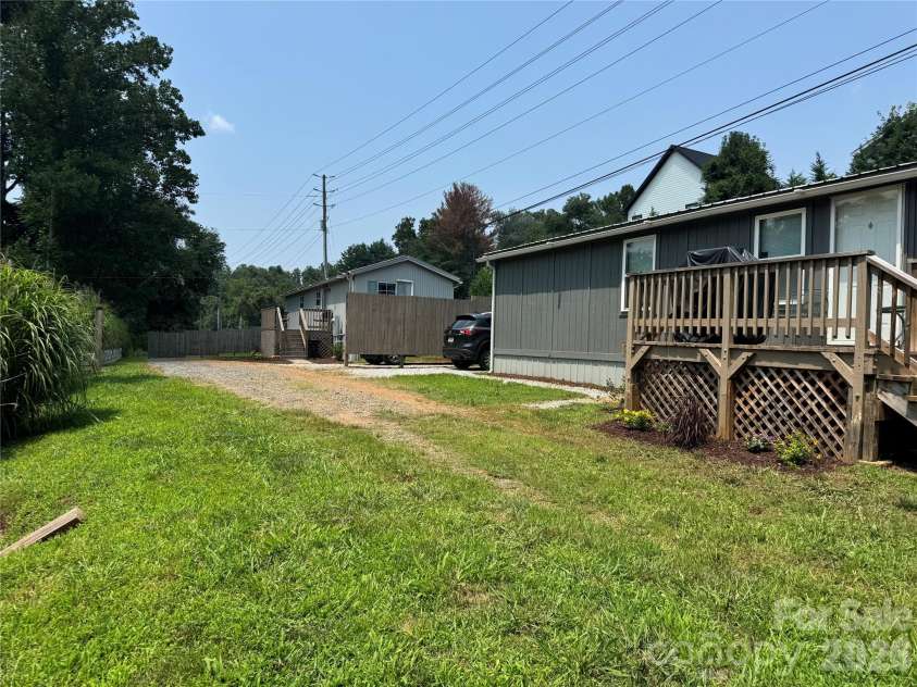 144 Clayton Road, Arden, NC 28704.  MLS# CAR4408237, YatesRealty ID 40113. 