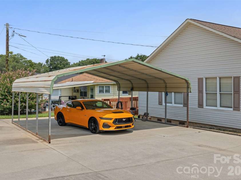 243 8th Avenue, Cramerton, NC 28032.  MLS# CAR4406563, YatesRealty ID 40126. Carport