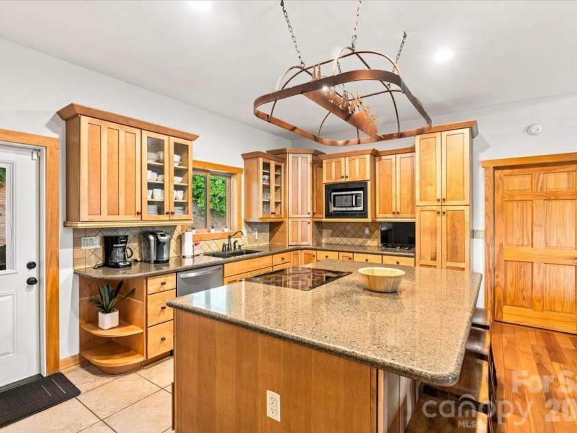179 Rock Spring Road, Lake Lure, NC 28746.  MLS# CAR4406141, YatesRealty ID 40134. Beautiful, comfortable open concept kitchen.