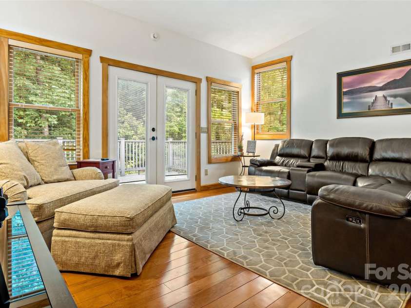 179 Rock Spring Road, Lake Lure, NC 28746.  MLS# CAR4406141, YatesRealty ID 40134. Loft with access to upper deck.