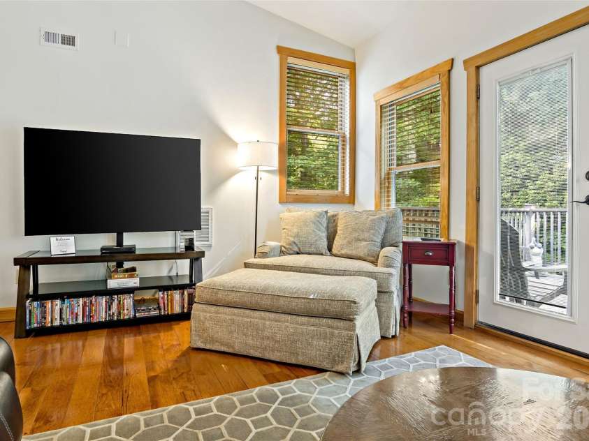 179 Rock Spring Road, Lake Lure, NC 28746.  MLS# CAR4406141, YatesRealty ID 40134. Loft with access to upper deck.
