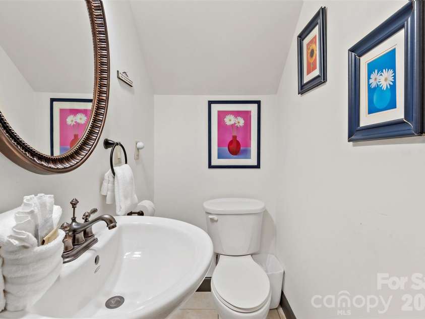 179 Rock Spring Road, Lake Lure, NC 28746.  MLS# CAR4406141, YatesRealty ID 40134. Lower Level half bath