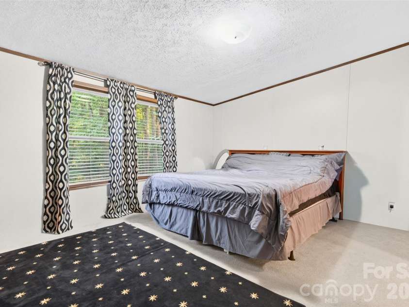 5249 Antler Drive, Iron Station, NC 28080.  MLS# CAR4401538, YatesRealty ID 40139. Primary Bedroom