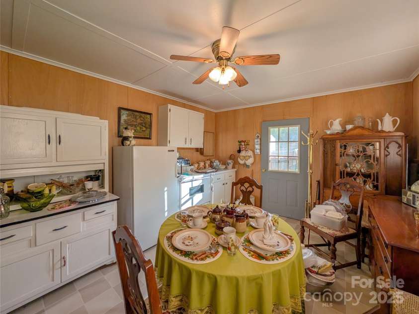 165 Cattail Creek Road, Burnsville, NC 28714.  MLS# CAR4298888, YatesRealty ID 4014. Take a peek inside the backyard shed to find this great additional space complete with electricity! Great studio opportunity! 