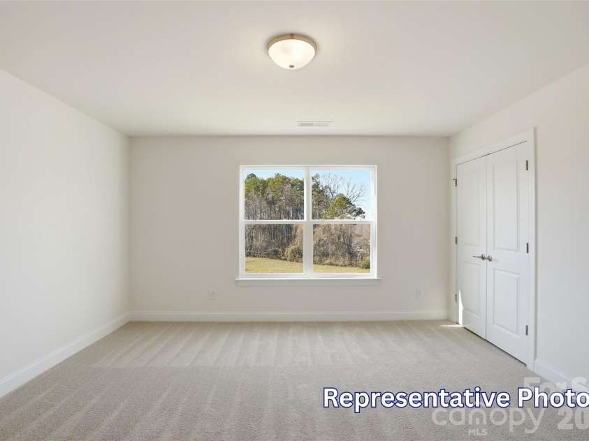 8470 Acadia Parkway, Sherrills Ford, NC 28673.  MLS# CAR4406421, YatesRealty ID 40142. Upper level bedroom