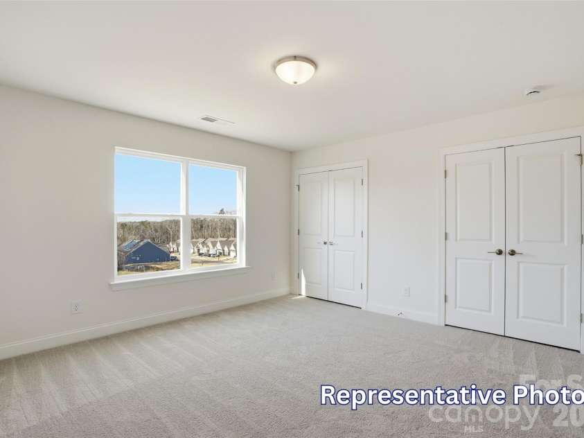 8470 Acadia Parkway, Sherrills Ford, NC 28673.  MLS# CAR4406421, YatesRealty ID 40142. Upper level bedroom