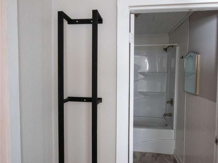 231 Cedar Valley Road, Hudson, NC 28638.  MLS# CAR4335238, YatesRealty ID 4015. Unique Towel Rack Outside Bath