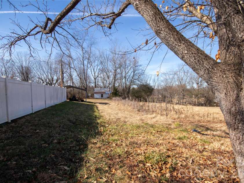 231 Cedar Valley Road, Hudson, NC 28638.  MLS# CAR4335238, YatesRealty ID 4015. View From Sharon Pl on Side Street