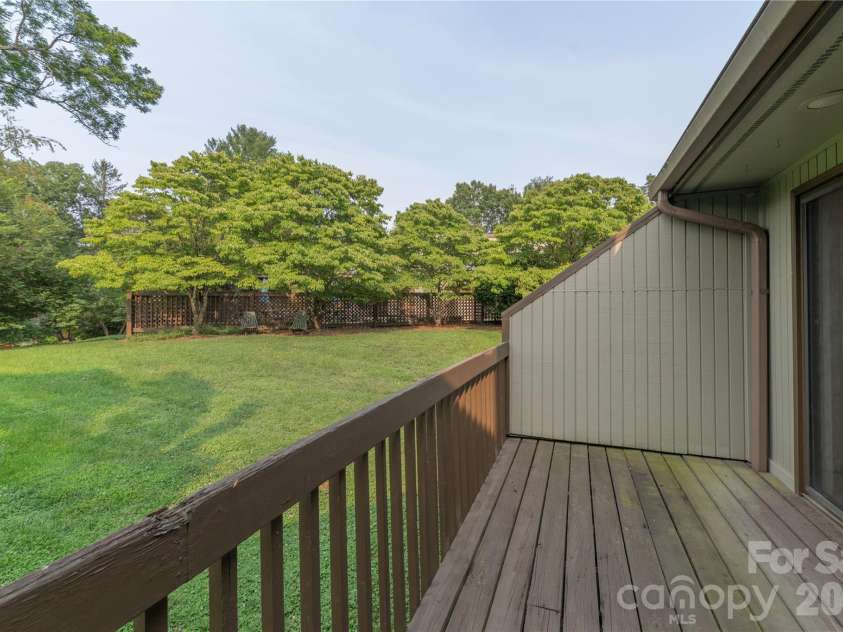 30 Maple Ridge Lane, Asheville, NC 28806.  MLS# CAR4408077, YatesRealty ID 40151. Back deck privacy