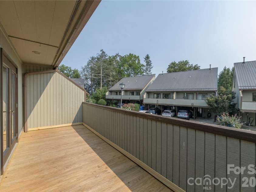 30 Maple Ridge Lane, Asheville, NC 28806.  MLS# CAR4408077, YatesRealty ID 40151. New front deckin, will be painted after wood cures.
