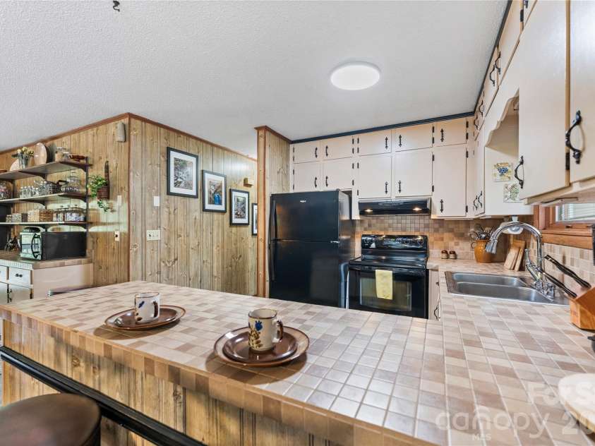 275 Knob Hill Estates Road, Sylva, NC 28779.  MLS# CAR4406505, YatesRealty ID 40155. 