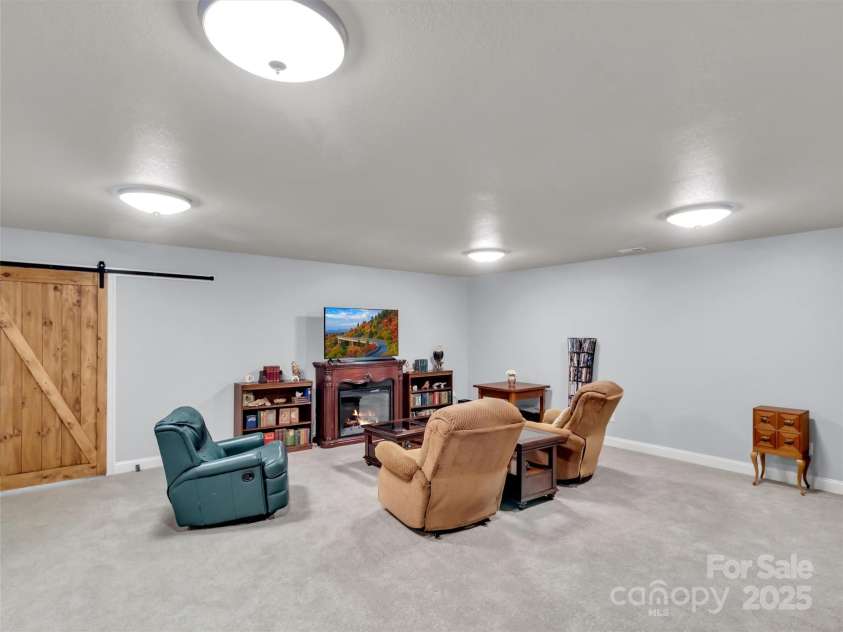 178 Sapphire Place, Clyde, NC 28721.  MLS# CAR4235049, YatesRealty ID 4016. Spacious Theatre Room/Game Room