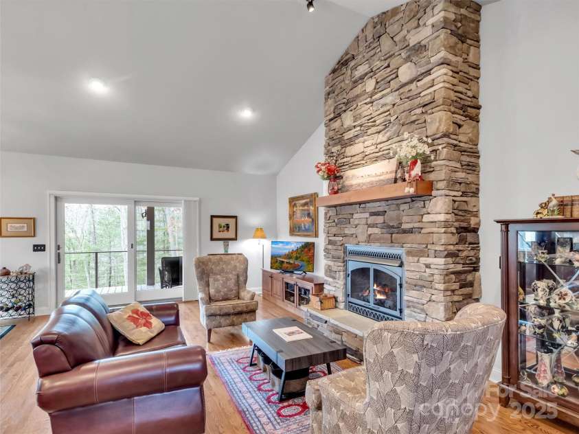178 Sapphire Place, Clyde, NC 28721.  MLS# CAR4235049, YatesRealty ID 4016. Stone Gas Fireplace
