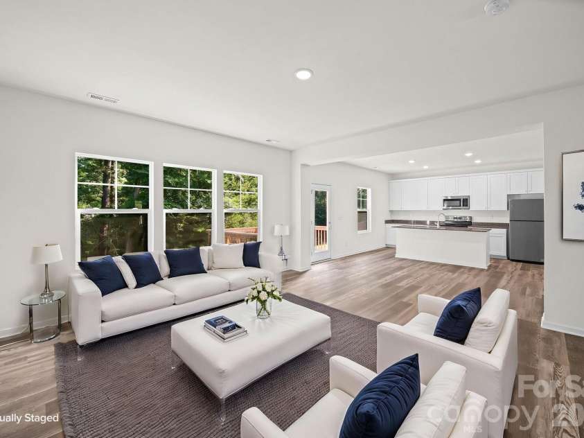 7809 Lane Drive, Charlotte, NC 28212.  MLS# CAR4395836, YatesRealty ID 40163. Great Room - Virtually Staged