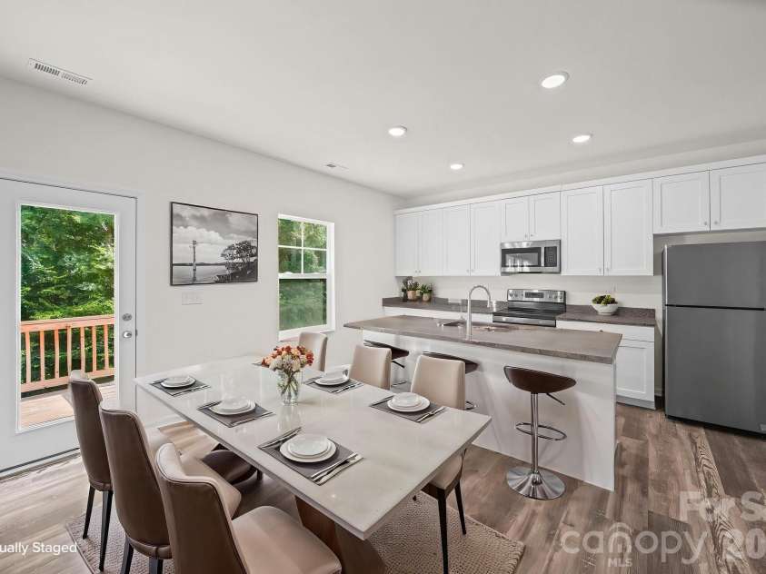 7809 Lane Drive, Charlotte, NC 28212.  MLS# CAR4395836, YatesRealty ID 40163. Kitchen and Dining Room - Virtually Staged