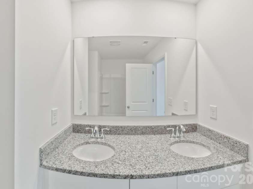 7809 Lane Drive, Charlotte, NC 28212.  MLS# CAR4395836, YatesRealty ID 40163. Primary Bathroom