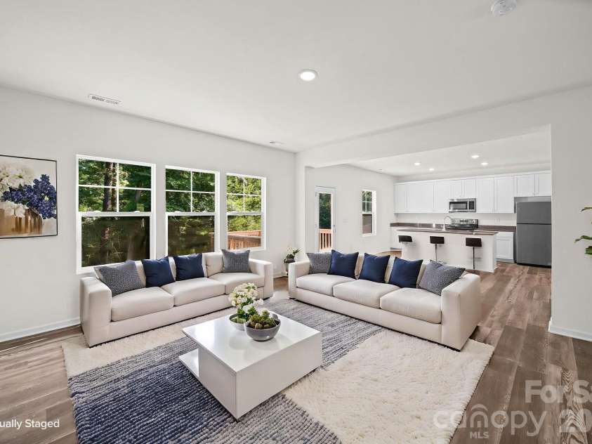 7813 Lane Drive, Charlotte, NC 28212.  MLS# CAR4395840, YatesRealty ID 40164. Great Room Virtually Staged