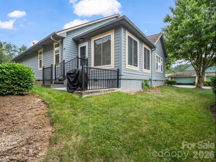 27 Gray Wolf Lane, Hendersonville, NC 28792.  MLS# CAR4285060, YatesRealty ID 4017. Back Patio