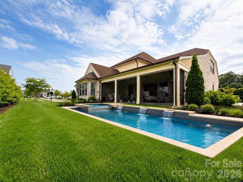 3066 Belden Drive, Fort Mill, SC 29715.  MLS# CAR4406676, YatesRealty ID 40174. Ai generated pool (NOT included in pricing)