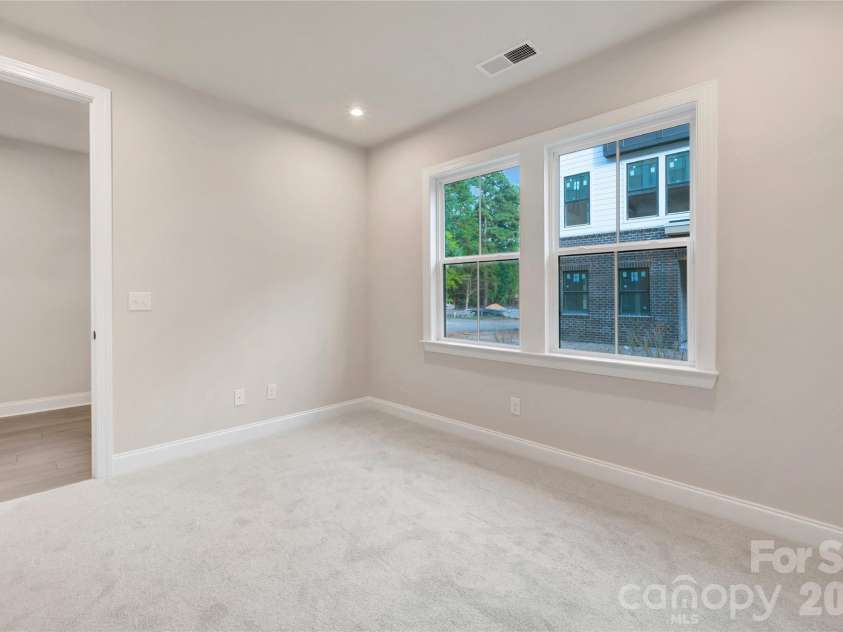 13009 Lucy Park Lane, Charlotte, NC 28277.  MLS# CAR4408613, YatesRealty ID 40179. First floor GenSmart Suite Bedroom