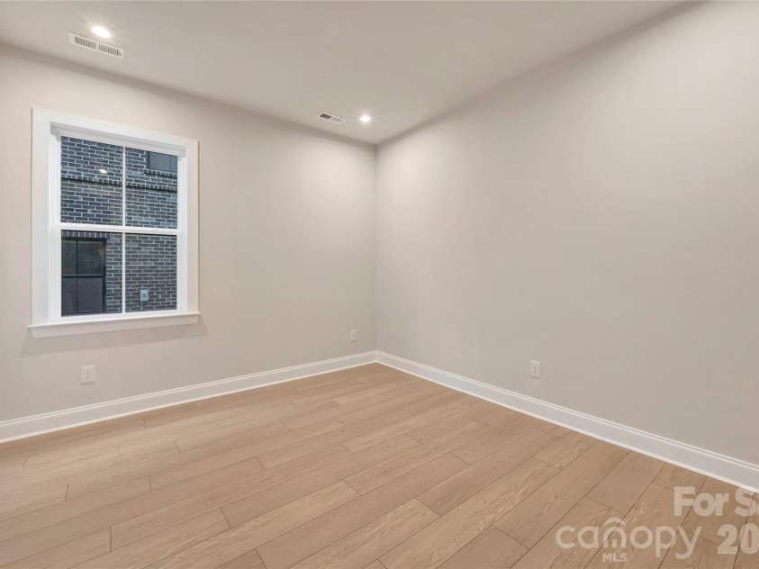 13009 Lucy Park Lane, Charlotte, NC 28277.  MLS# CAR4408613, YatesRealty ID 40179. First floor GenSmart Suite living room