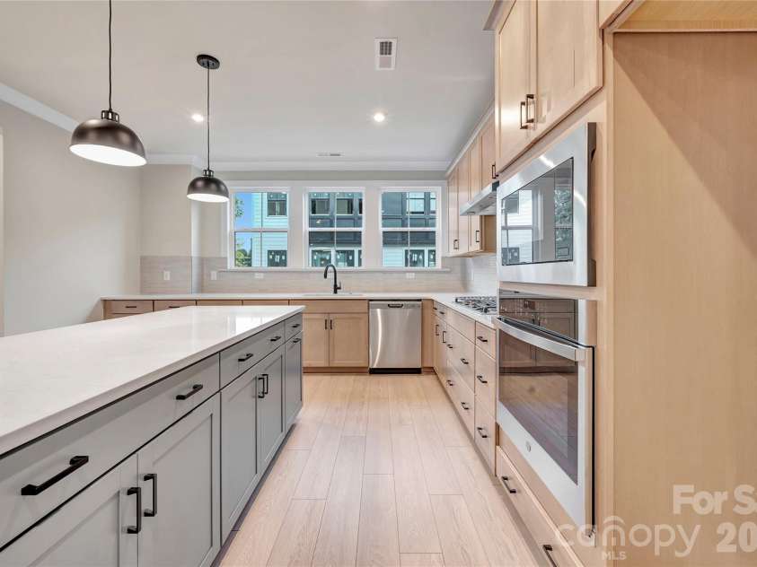 13009 Lucy Park Lane, Charlotte, NC 28277.  MLS# CAR4408613, YatesRealty ID 40179. Large windows in the gourmet kitchen