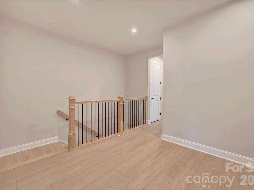 13009 Lucy Park Lane, Charlotte, NC 28277.  MLS# CAR4408613, YatesRealty ID 40179. Third floor landing with open rails
