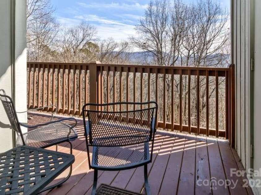 426 Windswept Drive, Asheville, NC 28801.  MLS# CAR4299787, YatesRealty ID 40185. GUEST BEDROOM PRIVATE DECK