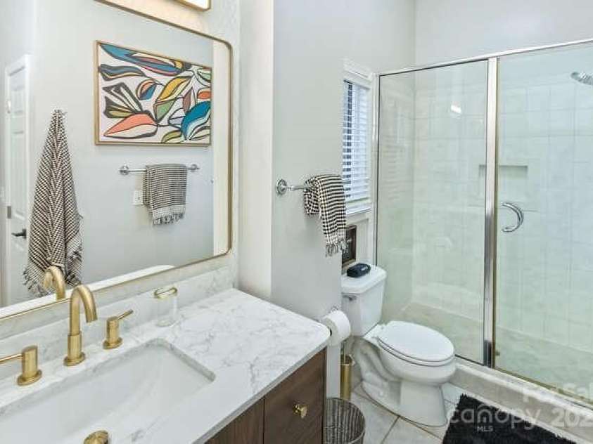 426 Windswept Drive, Asheville, NC 28801.  MLS# CAR4299787, YatesRealty ID 40185. PRIMARY ENSUITE BATHROOM WITH WALKIN SHOWER 