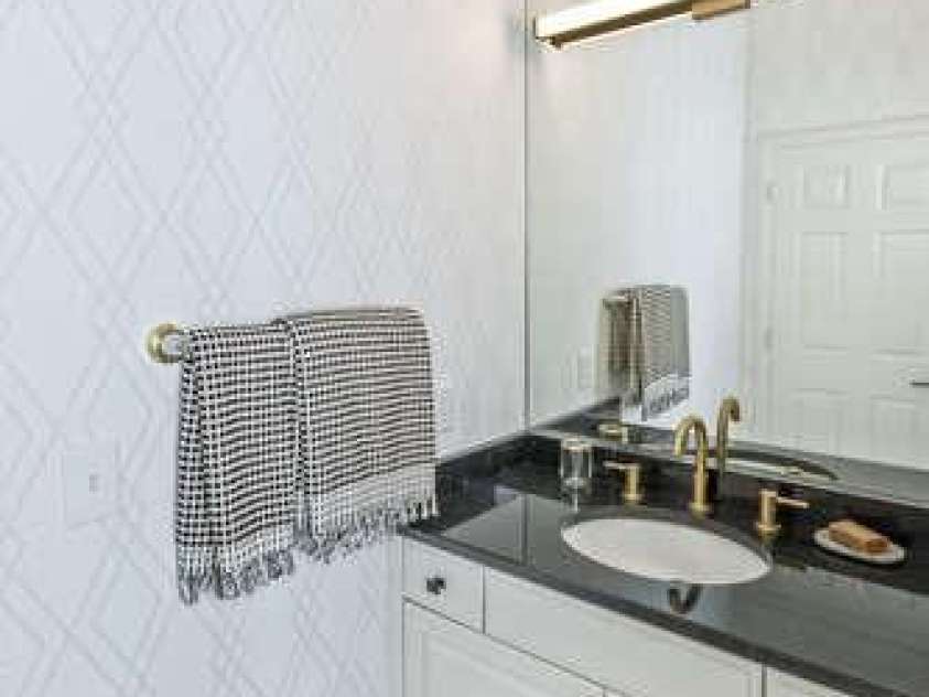 426 Windswept Drive, Asheville, NC 28801.  MLS# CAR4299787, YatesRealty ID 40185. UPDATED POWDER ROOM 