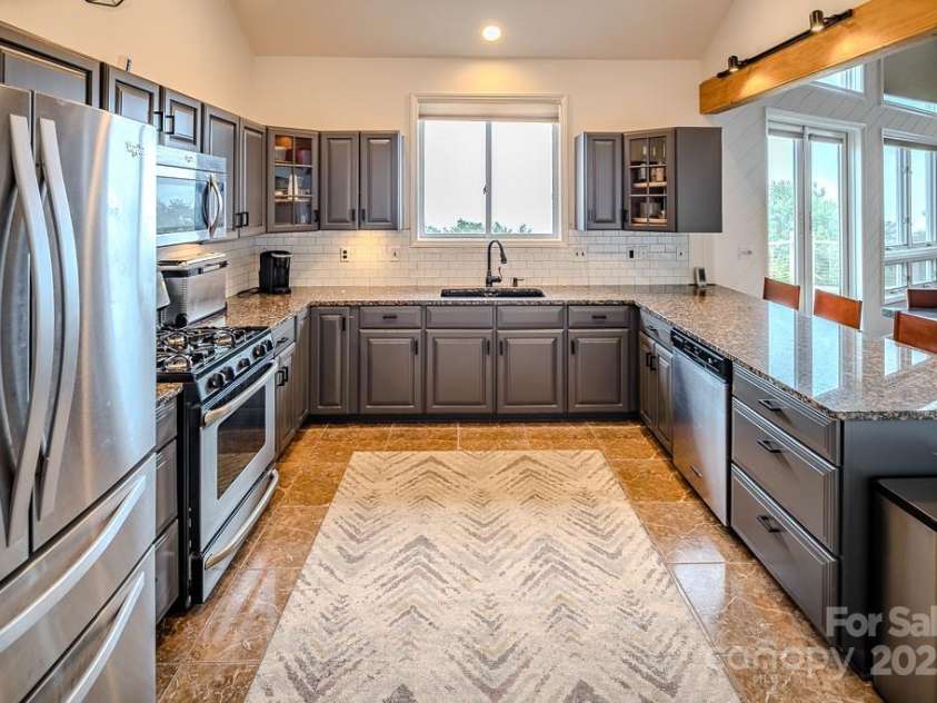 100 Misty Hollow Lane, Beech Mountain, NC 28604.  MLS# CAR4309915, YatesRealty ID 40198. 