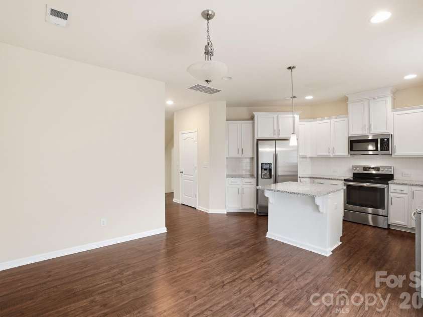327 Annandale Drive, Fort Mill, SC 29708.  MLS# CAR4387061, YatesRealty ID 40200. Kitchen and dining area