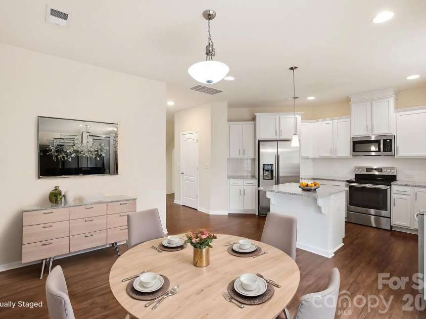 327 Annandale Drive, Fort Mill, SC 29708.  MLS# CAR4387061, YatesRealty ID 40200. Virtually staged - kitchen and dining area