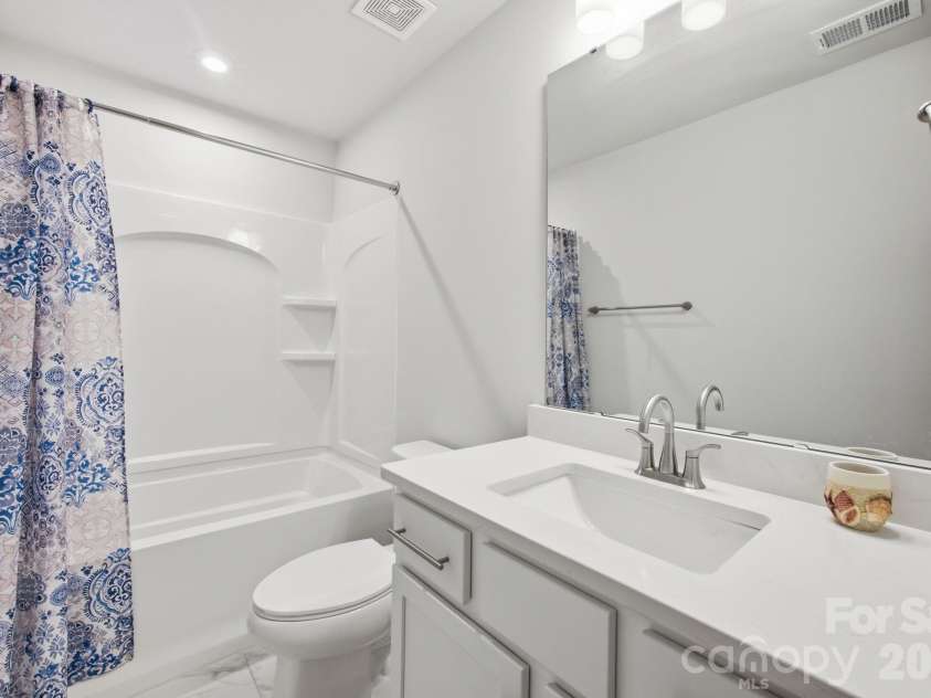 311 Coronado Avenue, Matthews, NC 28104.  MLS# CAR4400272, YatesRealty ID 40201. 1 of 2 upstairs secondary full baths
