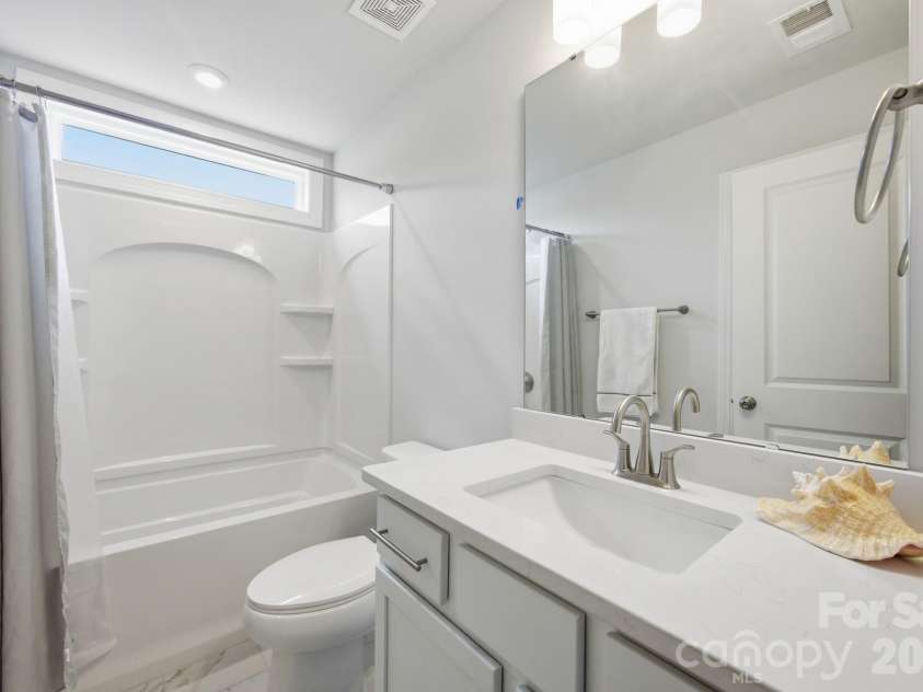 311 Coronado Avenue, Matthews, NC 28104.  MLS# CAR4400272, YatesRealty ID 40201. 2nd upstairs full bath